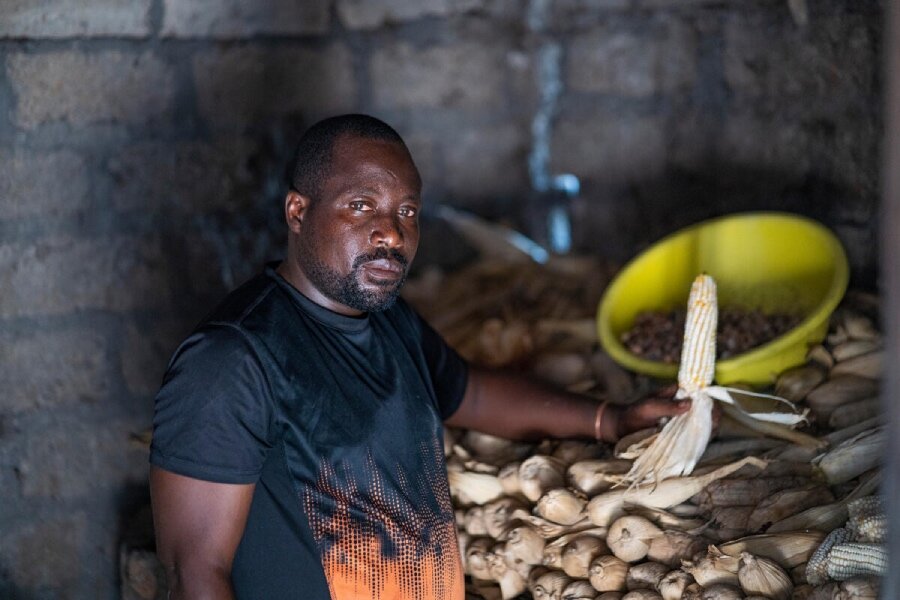 The rehabilitated bridge has sharply cut transport costs for maize farmer Paul Massoudi Balipe, translating into lower prices for his clients. Photo: WFP/Michael Castofas