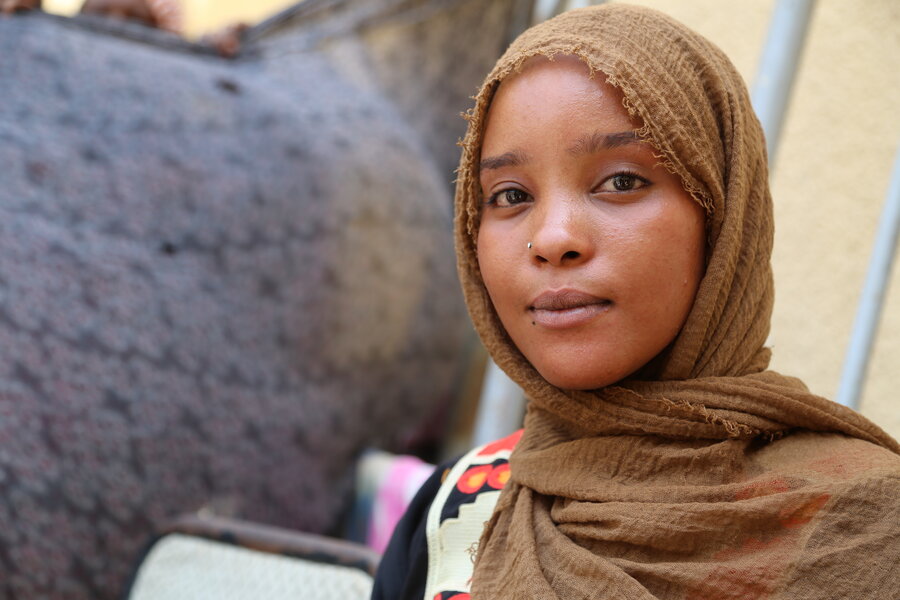 Aziza Mohammed Izak left her life behind in Khartoum. Now, she's uncertain about how to start anew. Photo: WFP/Leni Kinzli
