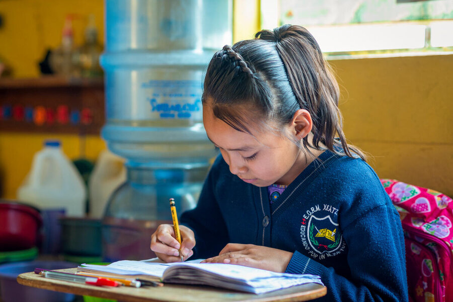 This young student in Patzun, Guatemala, eats school meals made from ingredients supplied by local smallholder farmers - in a broader bid to deliver nutritious, culturally accepted foods to students. Photo: WFP/Giulio d'Adamo