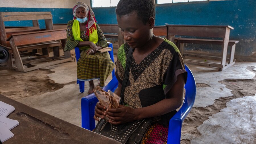 Florence receives WFP cash assistance that is a lifeline for her family. But she fears the day when it will run out. Photo: WFP/Michael Castofas