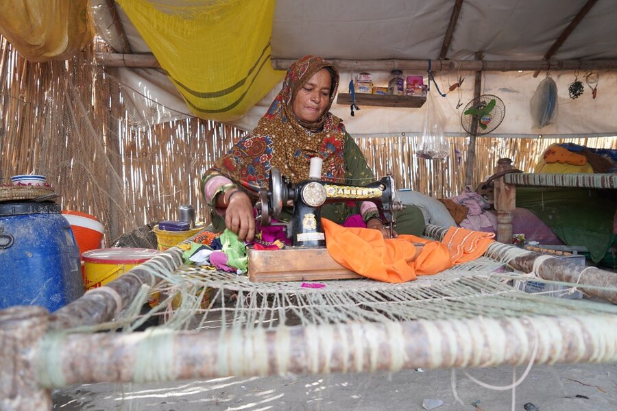 Husan at her sewing machine