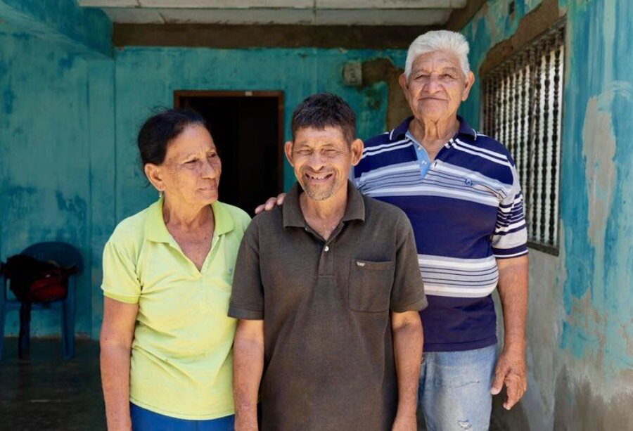 In northeastern Venezuela, 52-year-old Luis Enrique (C) - here with his father Luis Garcia (R) - is going to school for the first time, and getting WFP school meals. Photo: WFP/Marianela Gonzalez