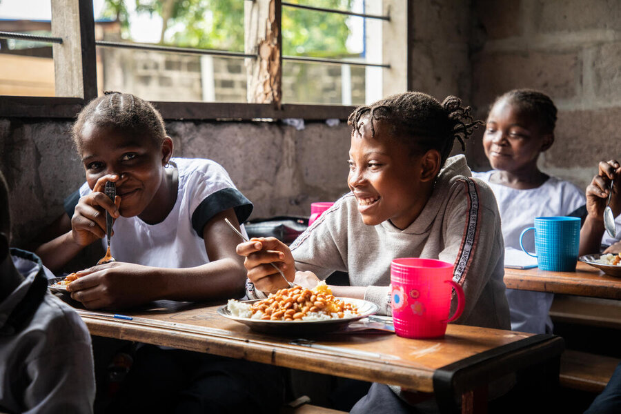 Children take lunch at a school supported by WFP in Kinshasa, in the Democratic Republic of the Congo. Photo: WFP/Vincent Tremeau