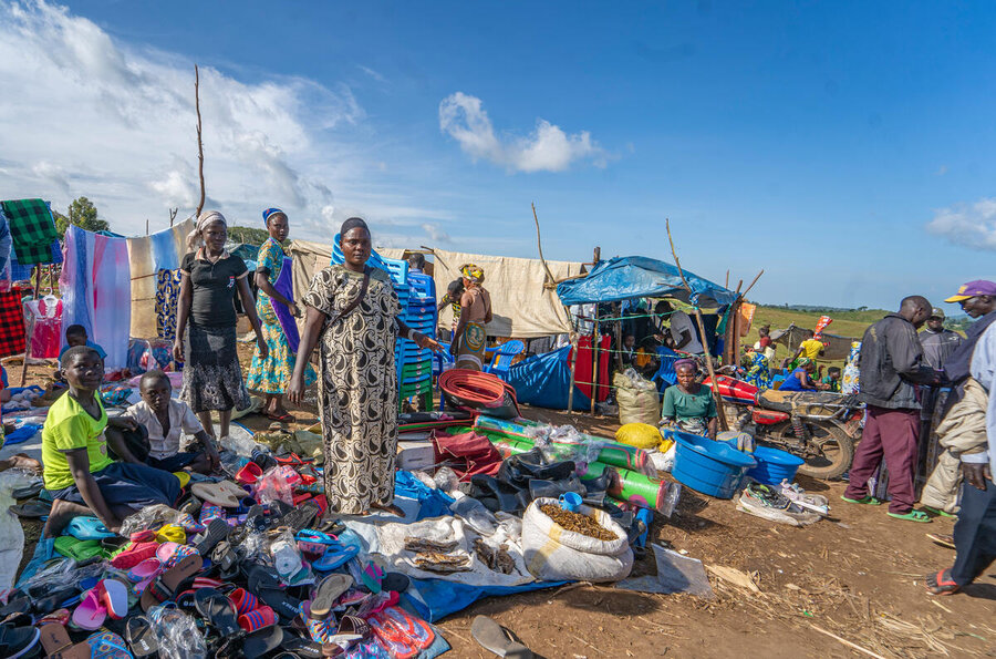 A woman in a camp in Bunia runs a makeshift stall started with WFP cash assitance. Photo: WFP/Michael Castofas