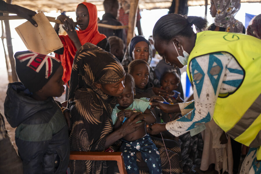 A displaced child is checked for malnutrition in Renk, South Sudan, where hunger grows among new arrivals from Sudan the longer they stay. Photo: WFP/Hugh Rutherford