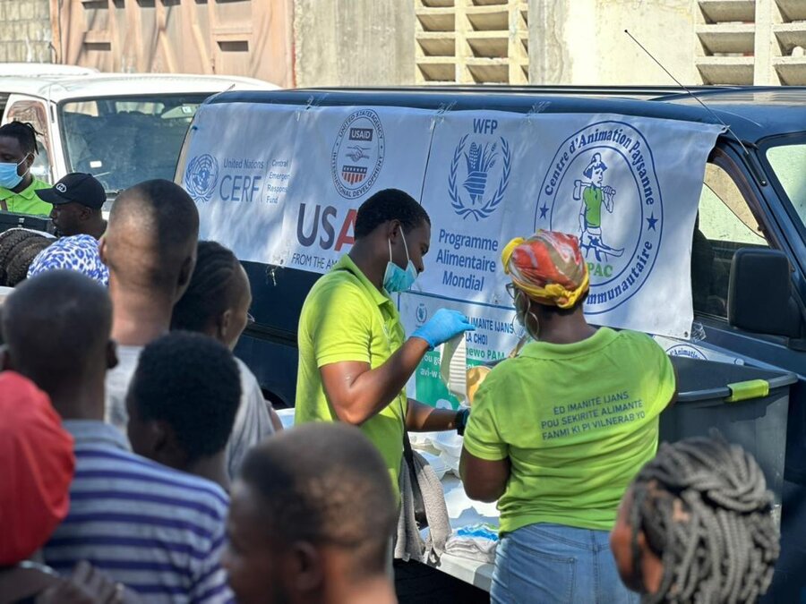 Haitians line up for food assistance in capital Port-au-Prince. More than four in 10 countrywide are acutely food insecure. Photo: WFP/Jean Vadler Presume