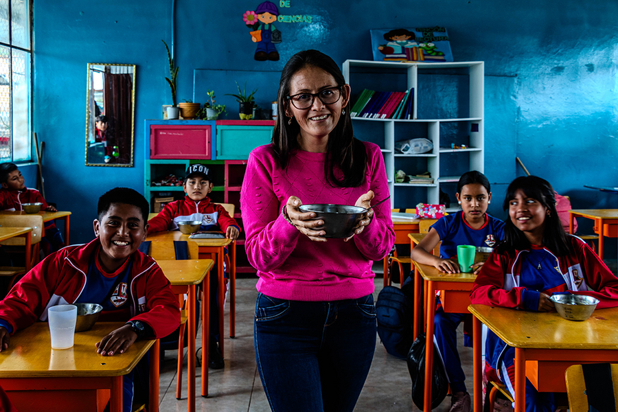 Martha Solano in a classroom with her students