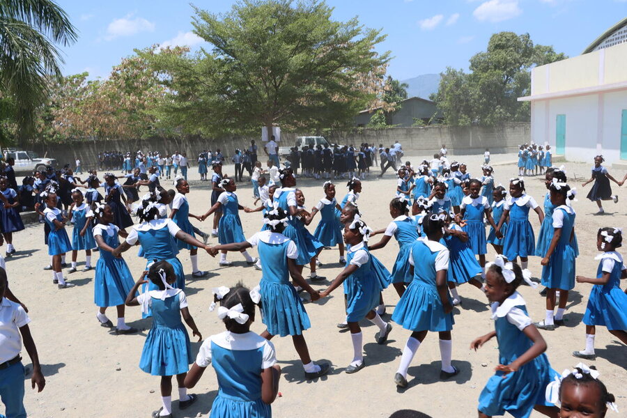 Students at recess in the playground at school in Camp-Morin, Nord Department, where WFP supports the delivery of hot meals