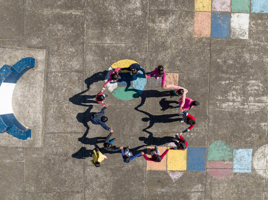 Children play after having lunch at school. Photo: WFP/Esteban Barrera