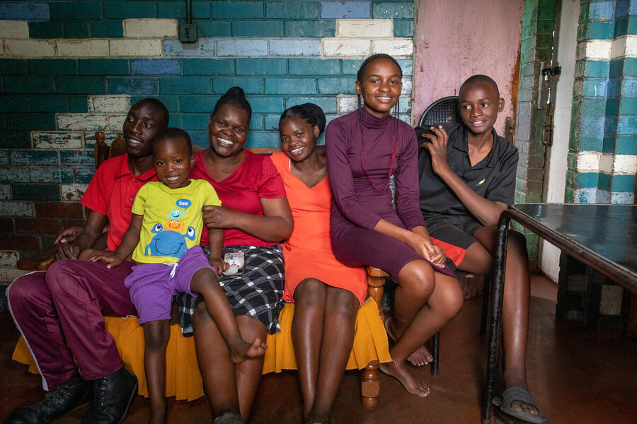Edith Ndebele (40) with her 4 children and niece (L-R: Preacher, Teboho, Michelle, Progress and Professor) at their home in Bulawayo, Zimbabwe.