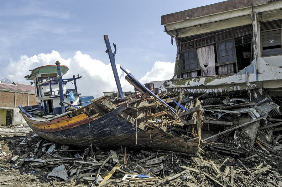 Destroyed boat amid wreckage in Banda Aceh after 2004 tsunami