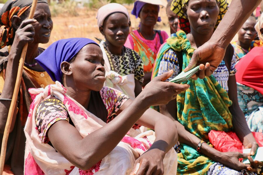 Women receiving WFP food assistance in Leer County, South Sudan in 2017, when a famine was confirmed. Photo: WFP/George Fominyen