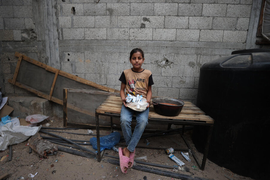 A girl in Khan Younis, Gaza, in April – by the end of that month most Gazans had run out of supplies that got in before the 2 March blockade. Photo: WFP/Ali Jadallah
