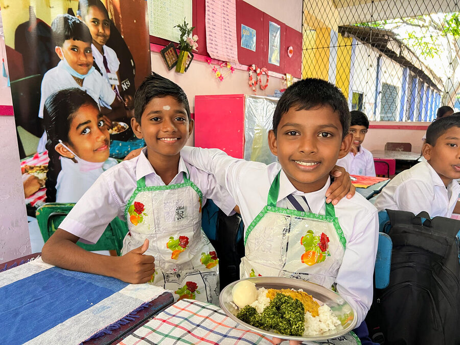 Two boys at lunch time in Sri Lanka