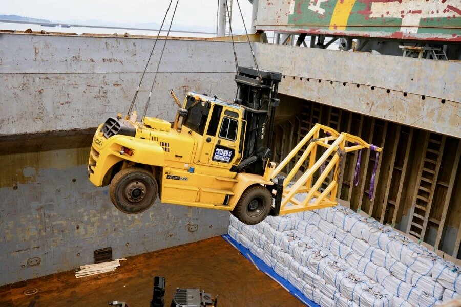 A forklift loads Republic of Korea rice onto a vessel at Gunsan Port. Photo: WFP/Yanghae Won