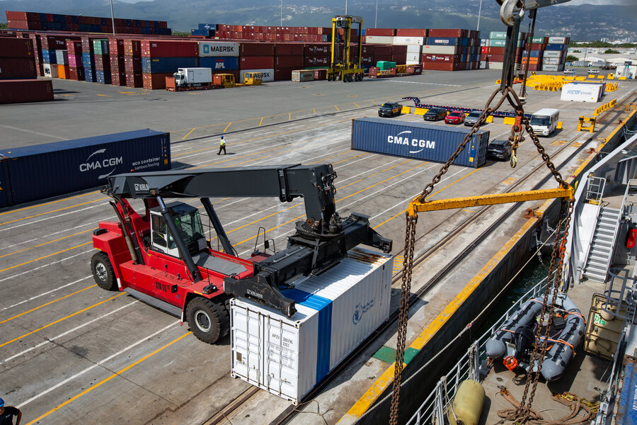 WFP cargo being loaded onto a ship at a port. Photo: WFP/Irshad Khan
