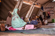 A family in an Internally Displaced Persons Camp in Sévaré, Mopti Region, February 2020, Photo: WFP/Benoît Lognoné