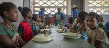 Children having a meal at school