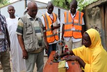 A young tailor practising her craft in Kiribiri Borno State in a livelihood project.