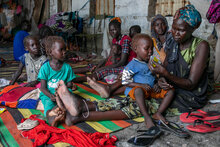 WFP:Photo/Eulalia Berlanga woman from Malakal who moved to Sudan with her four children last year after her husband passed away. She worked at the simsim farms to support her family but decided to come back to South Sudan after war broke out in Sudan.