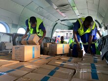 High-energy biscuits being loaded into an MI-8 helicopter