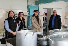 Head of WFP Office in Moldova, Katrien Ghoos, in a field visit with the Ambassador of France in Moldova, Mr. Paul Graham; and with Maria Neagu, Cooperation attaché of French Embassy in Moldova, at a Refugee Accommodation Centre (RAC) in Criuleni city. The manager of the RAC, Vasile Iapara, was showing to the delegation the canteen where the food is usually being cooked for the hosted refugees. Photo: WFP/ Daniela Oleinic