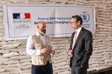 Photo: WFP/Musa Mahadi, Matthew Hollingworth WFP’s Country Director in South Sudan and H.E Marc Trouyet, French Ambassador to South Sudan at a WFP warehouse in the capital Juba.