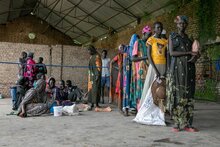 WFP/ Eulalia Berlanga People waiting to receive food at a food distribution in Malakal.