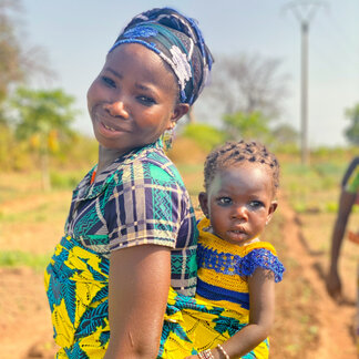A mother holding her baby