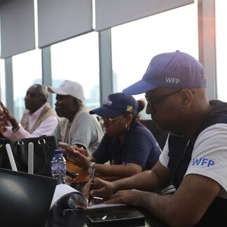 Meeting at the WFP DRC offices after visiting the Rapid Rural Transformation project, Kinshasa