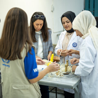 Syrian and Turkish beneficiaries learn the intricacies of leather processing in the Leather Sewing Course held under the Socioeconomic Empowerment and Sustainability Programme, WFP's livelihood programme in Türkiye. 