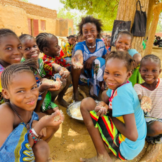 Children share a nutritious meal that supports learning and growth