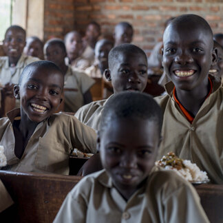 Schoolchildren having their school meals