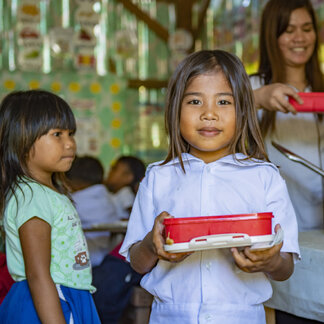 School children are having their meals