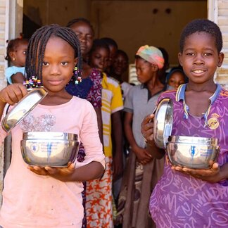 School children are taking their school meals provided by WFP