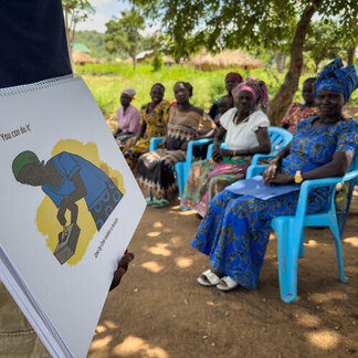 A group of women are taking a lesson in open air