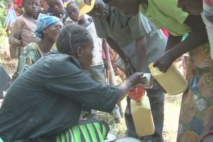 At An Emergency Food Distribution In DR Congo