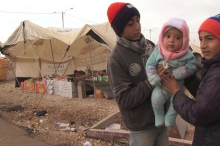 Food for Syrian Refugees In Cold Zaatari Camp