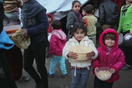 Syria: Families Cook Donated Food In Communal Kitchen