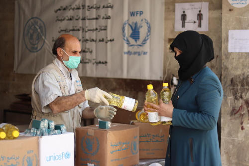 Food distribution, Aleppo, Syria. Photo: WFP/Khudr Alissa