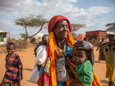 WFP/Georgina Goodwin A mother and children in Kabasa IDP camp.